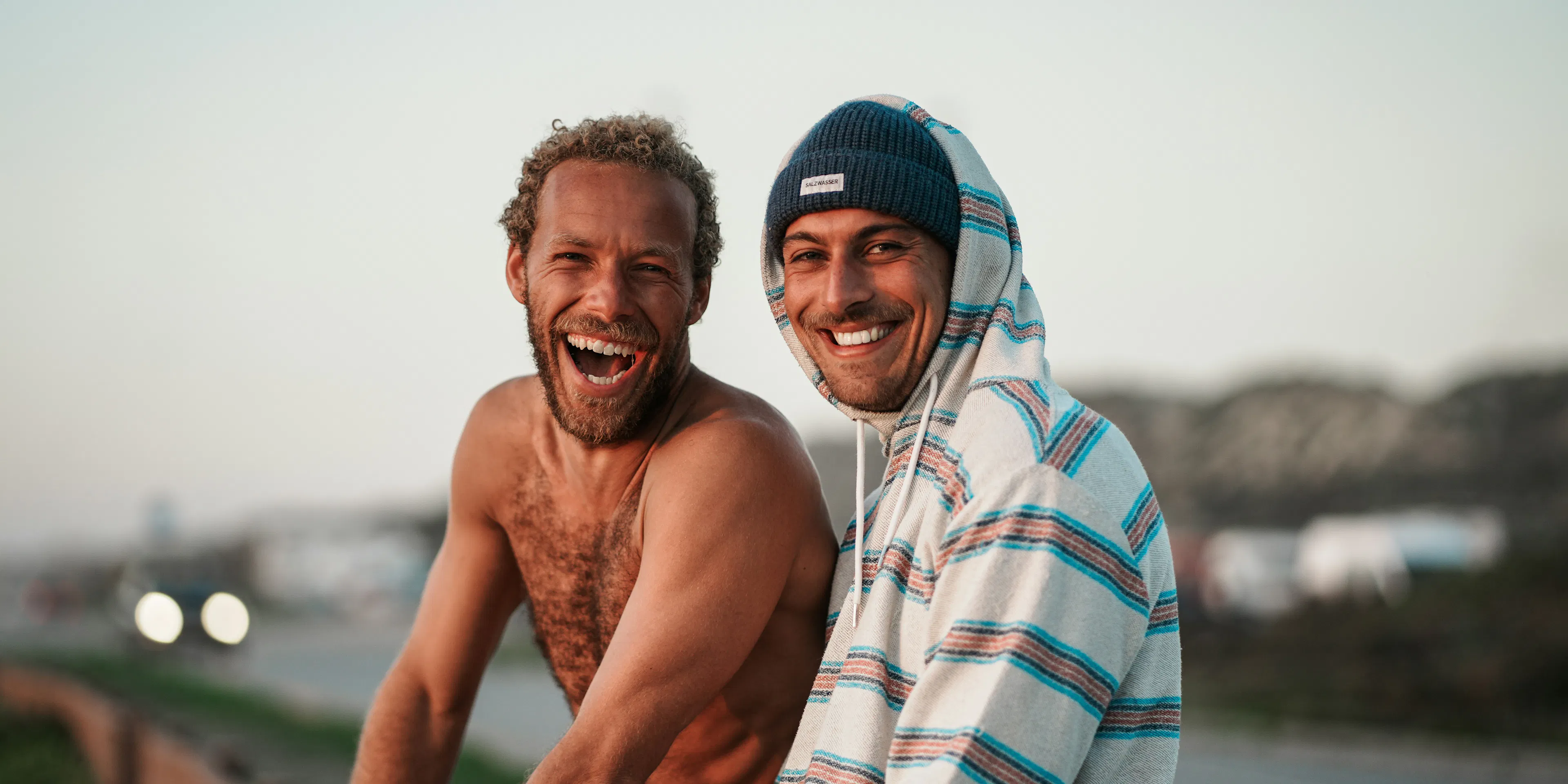 a couple of men standing next to each other