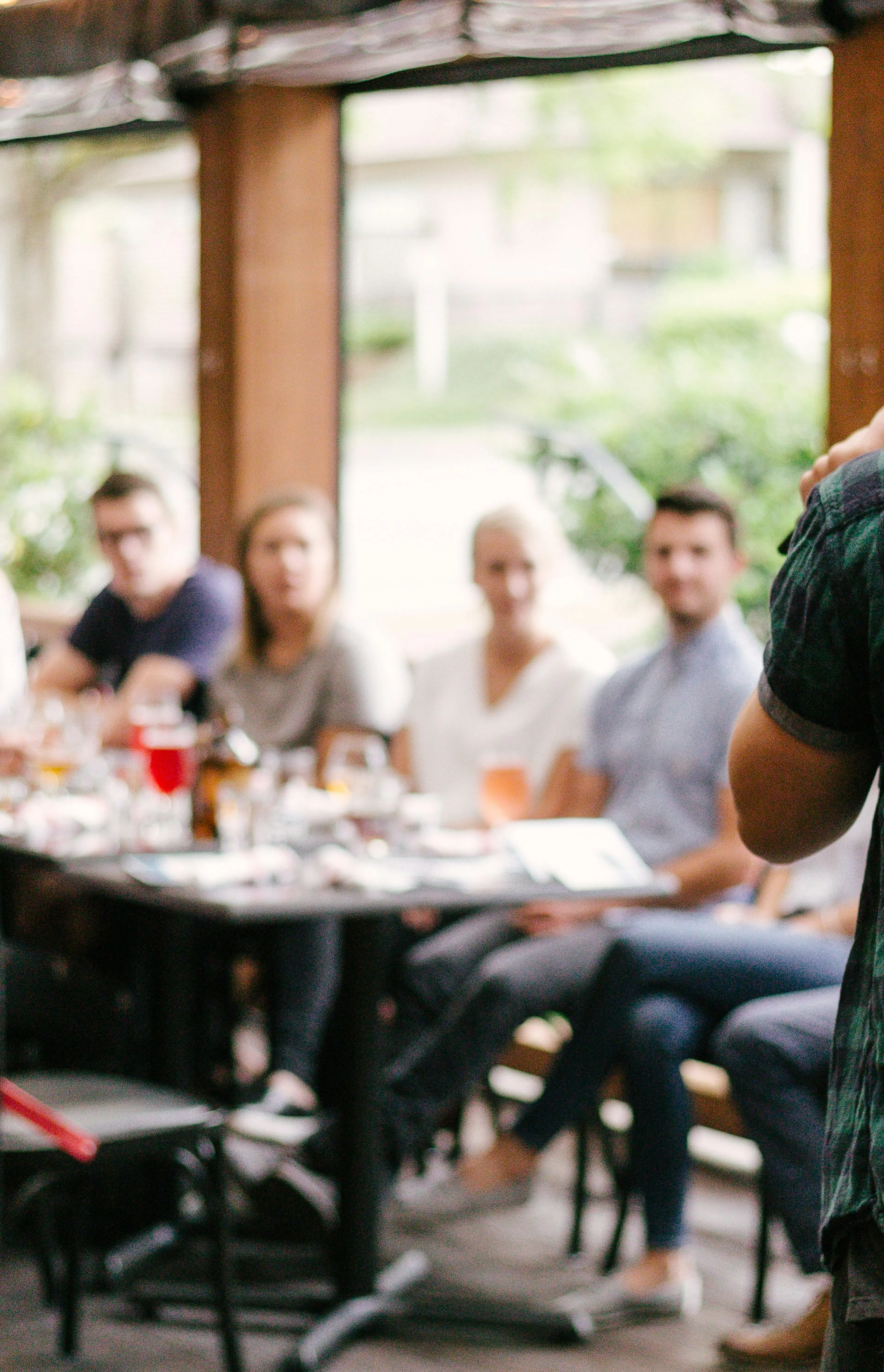 man standing infront of group of people
