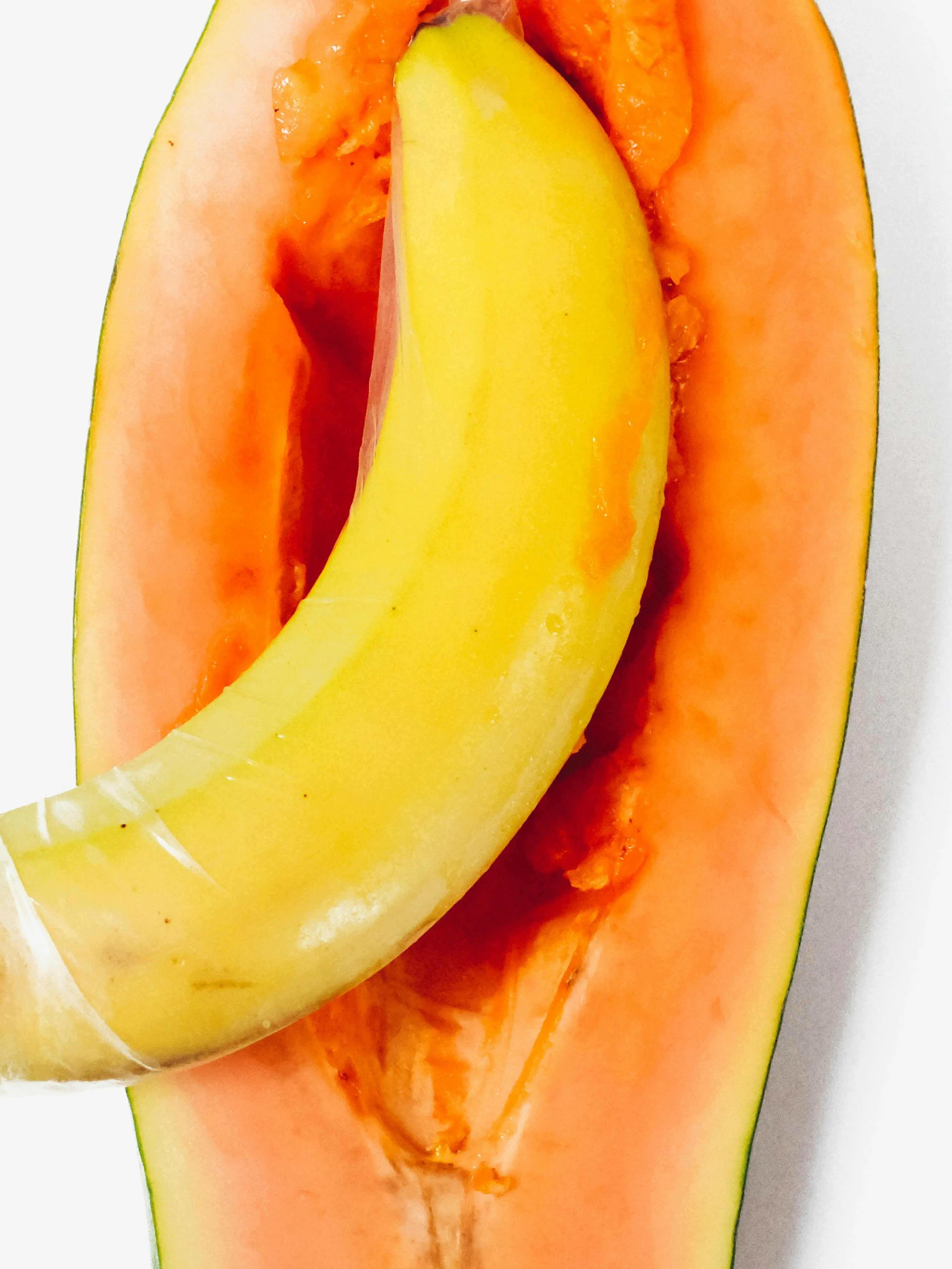 yellow banana on white surface