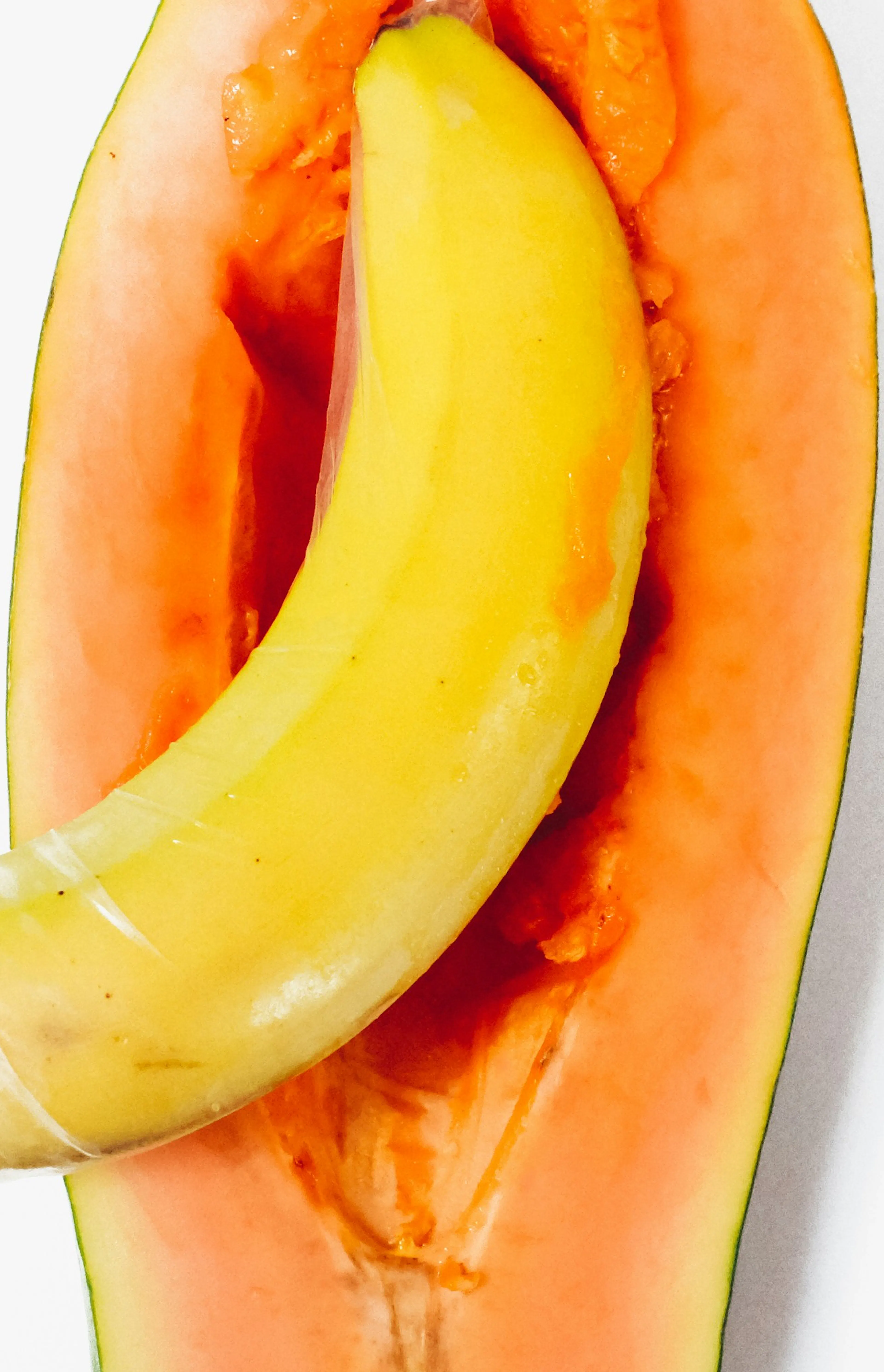 yellow banana on white surface
