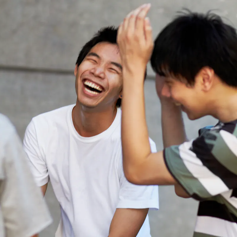 asian boys laughing