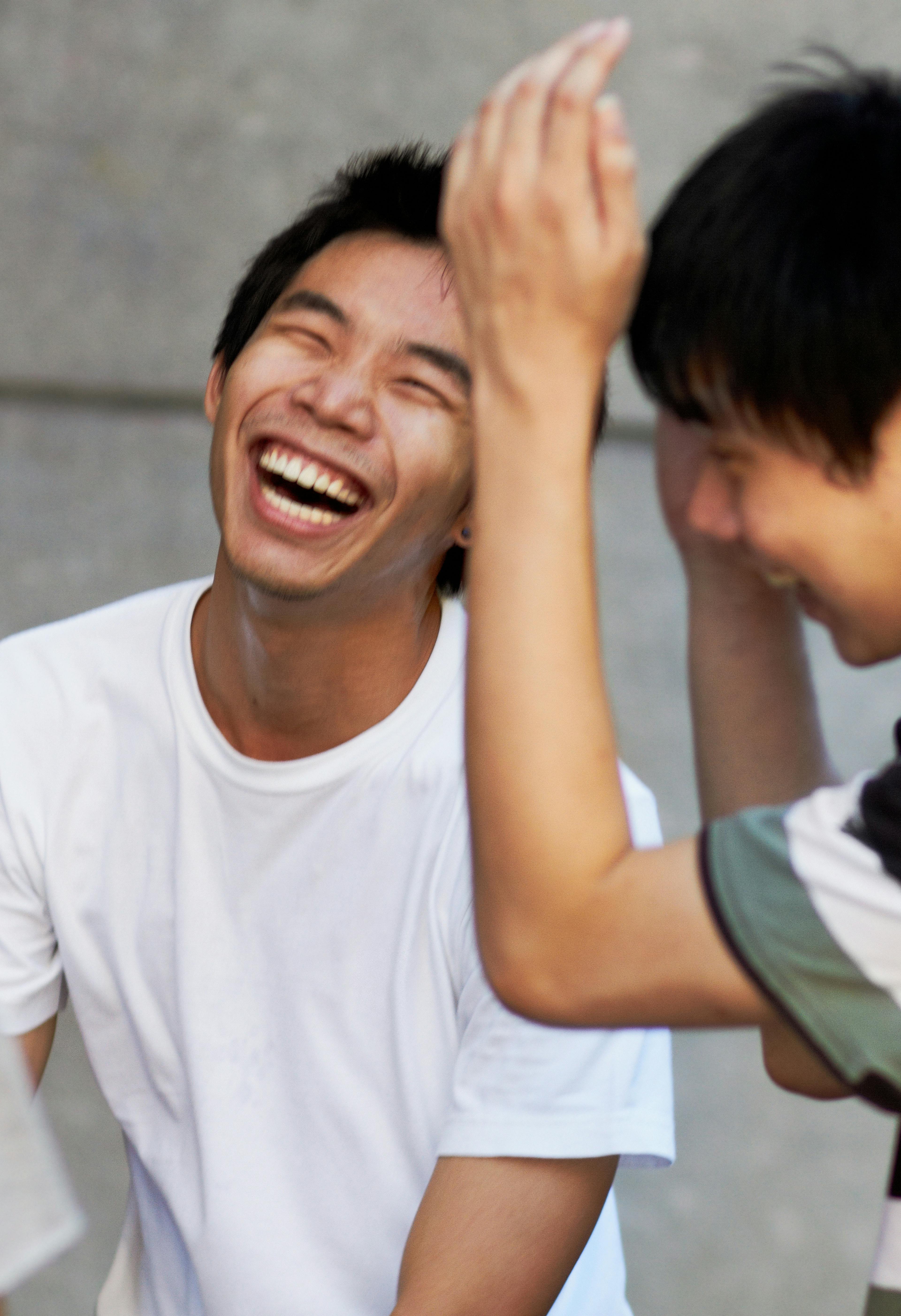 asian boys laughing