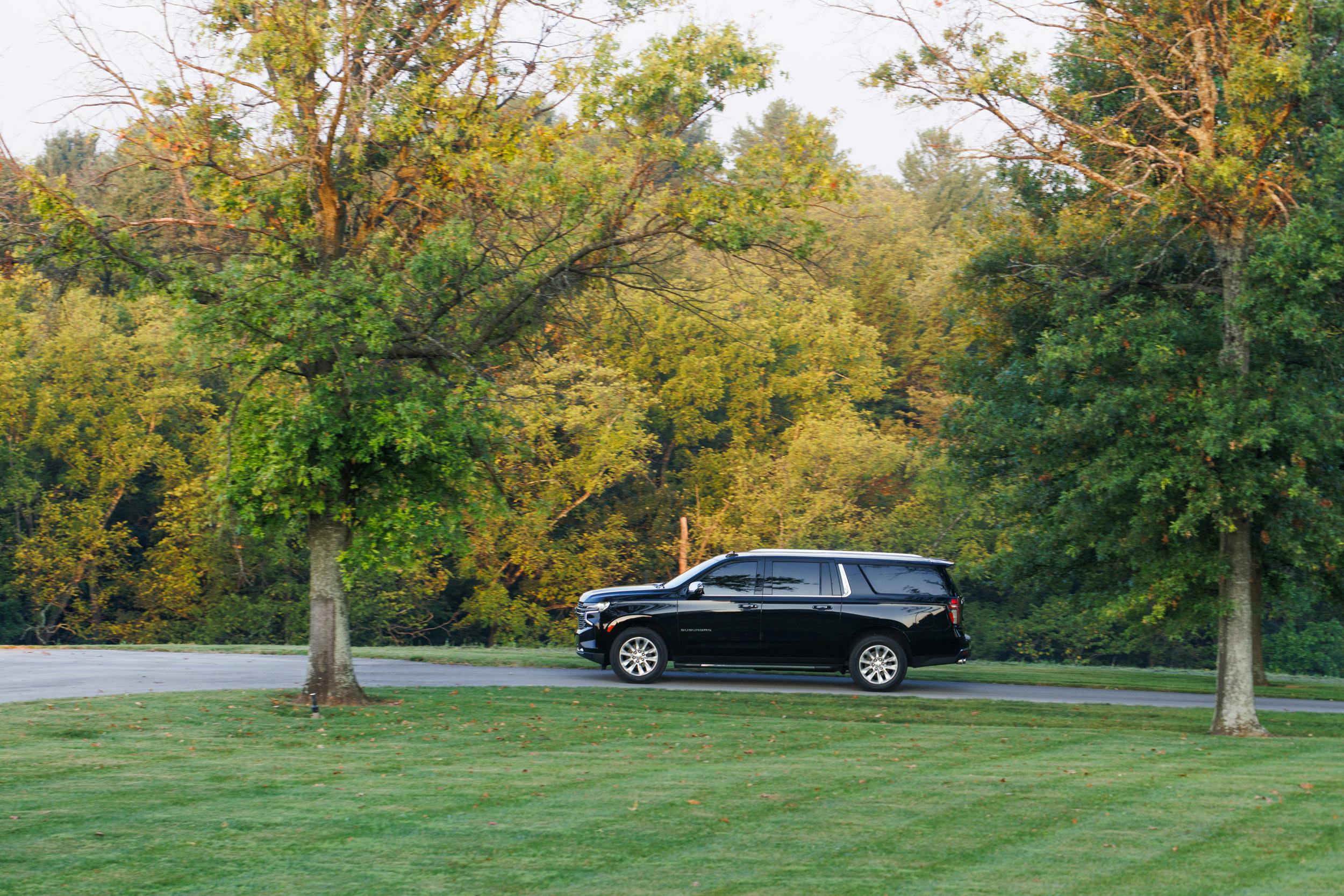 Mint Julep Experiences SUV travels through the tree line of Buffalo Trace Distillery