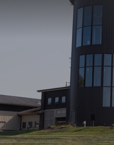 A cropped view of the Lux Row Distillery buildings.