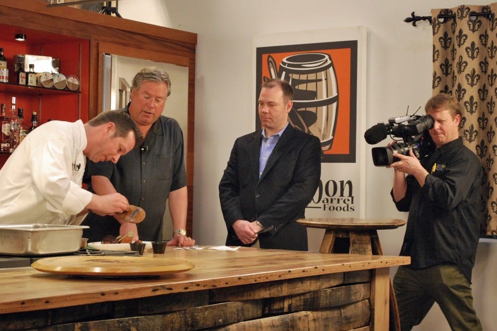 Behind the scenes of the "Secrets of Bluegrass Chefs," showcasing the camera man and chef in action.