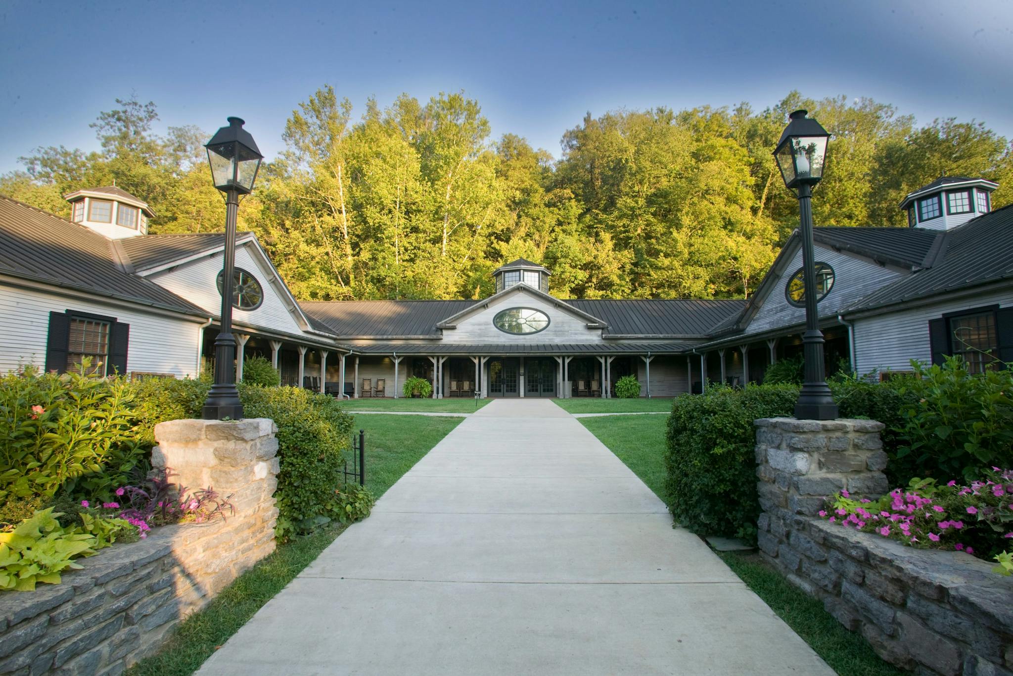 A summer photo of the Jack Daniel's distillery and welcome center