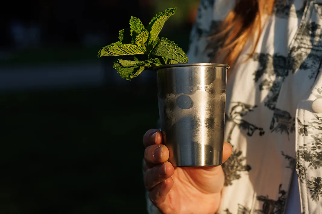 A mint julep cocktail being enjoyed on kentucky derby weekend