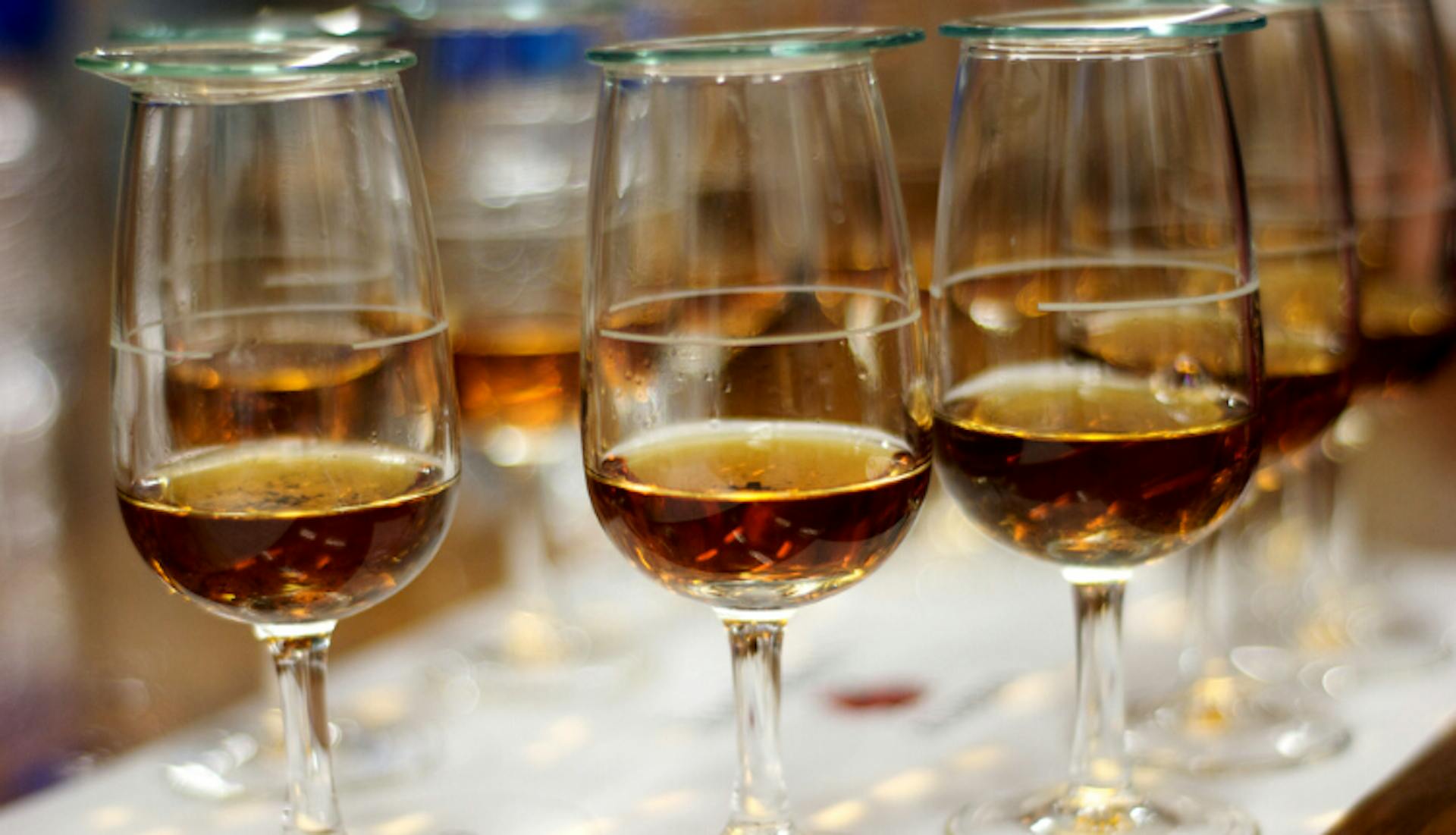 Glasses of whiskey.