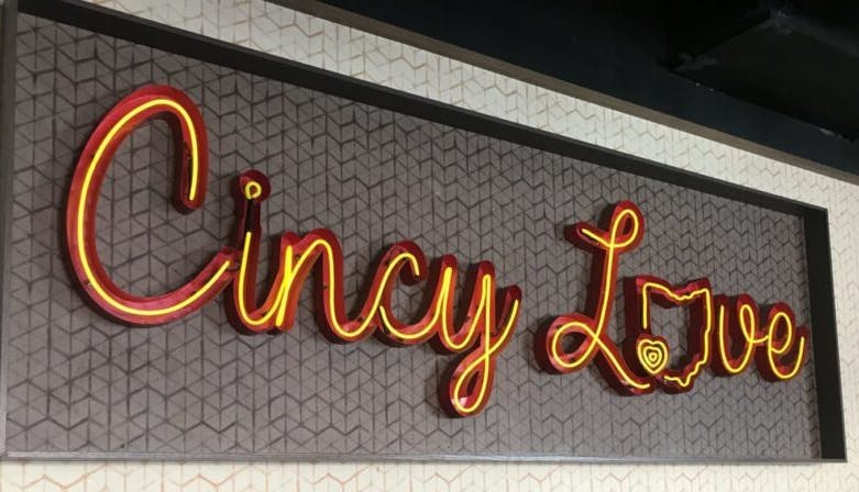 A sign that reads "Cincy Love," glowing brightly.