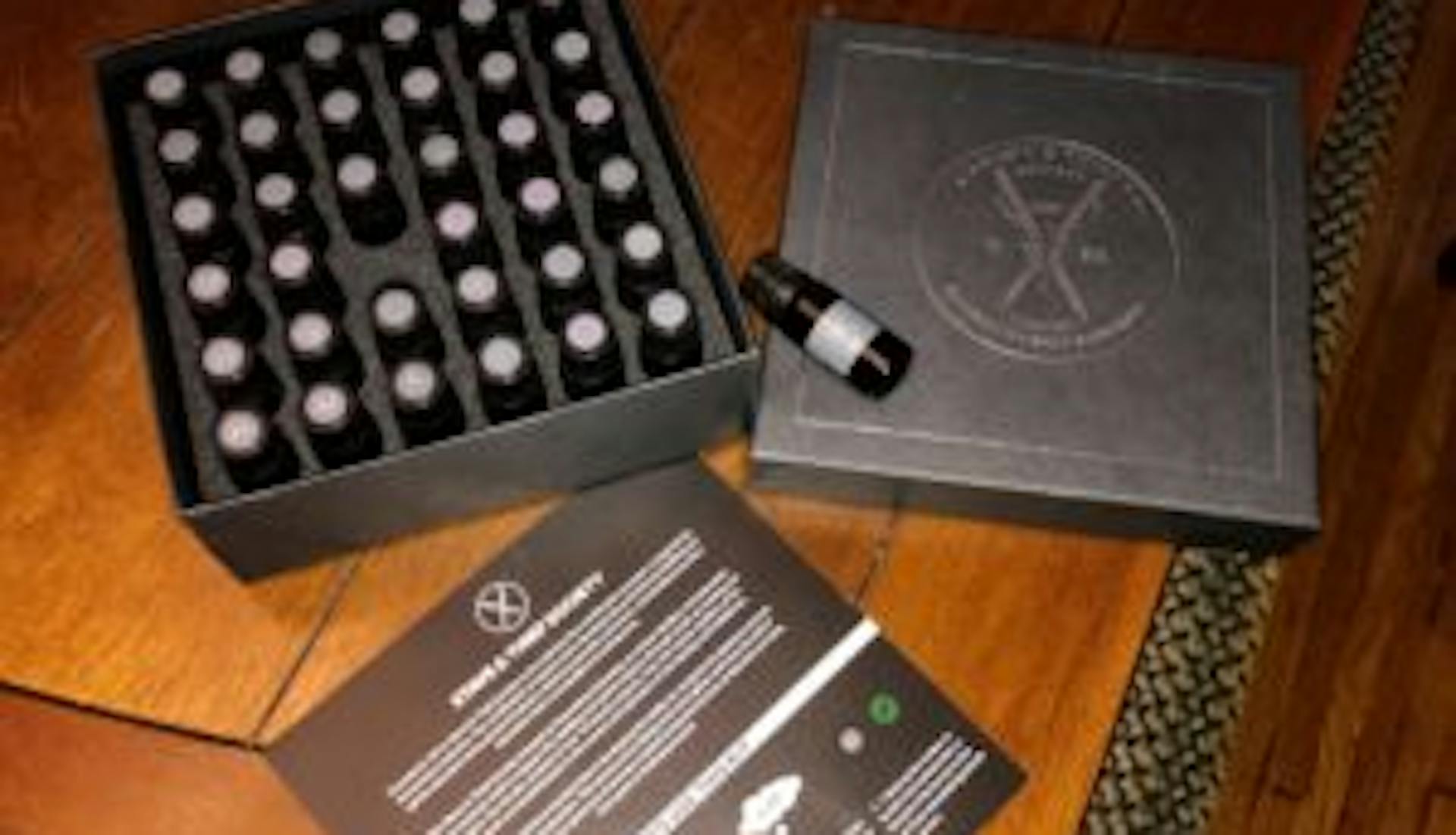 A Stave & Thief sensory kit featuring vials filled with various bourbon scent samples.