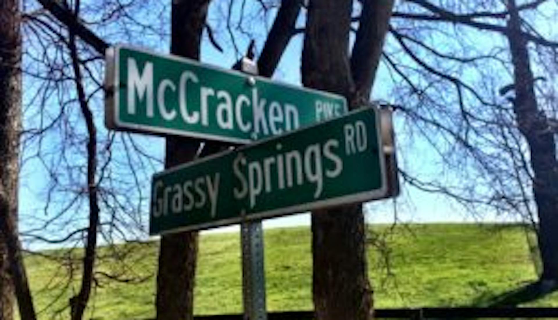 McCracken and Grassy Springs road signs.
