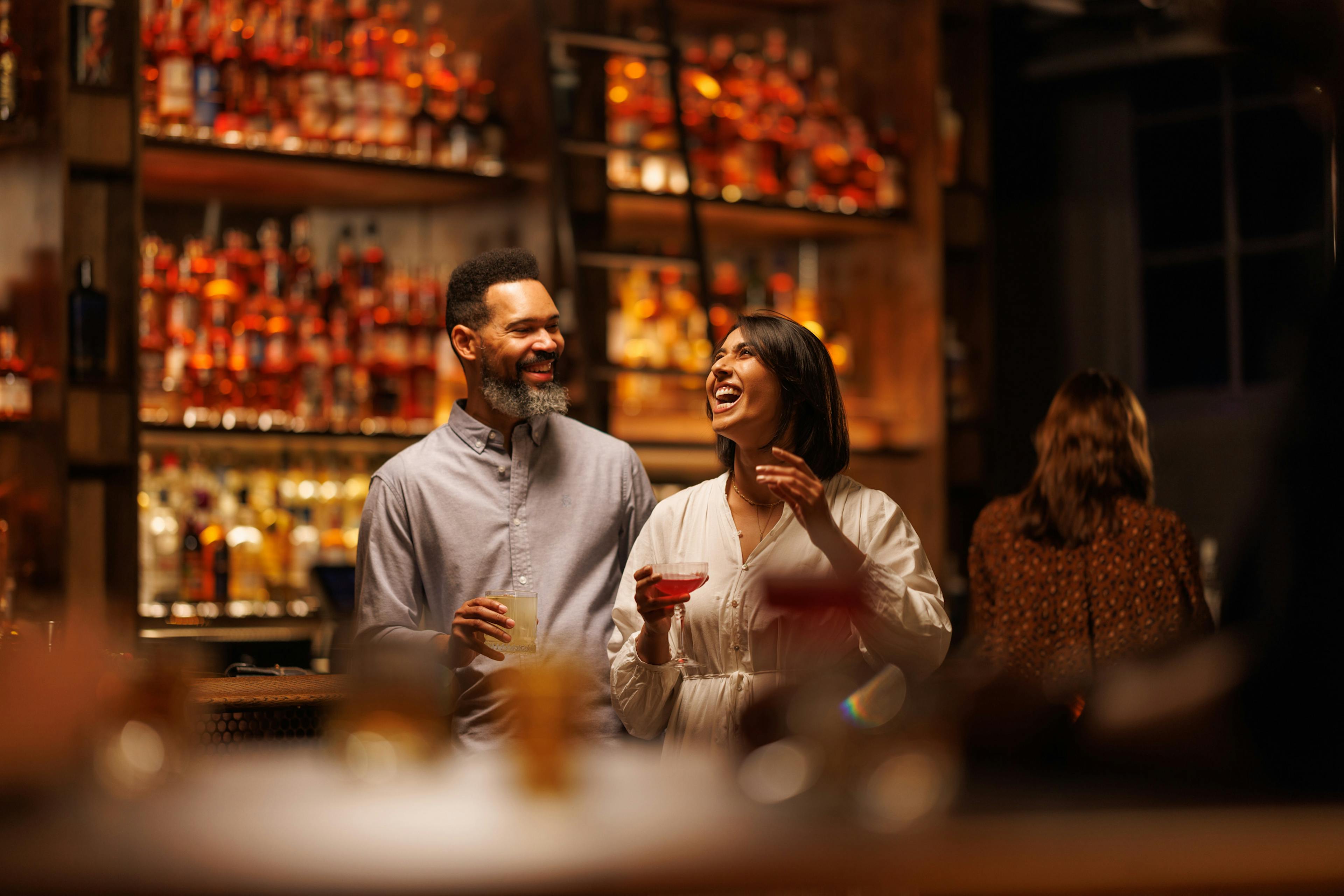 a couple enjoying the 2025 fete & feast experience with mint julep in louisville 