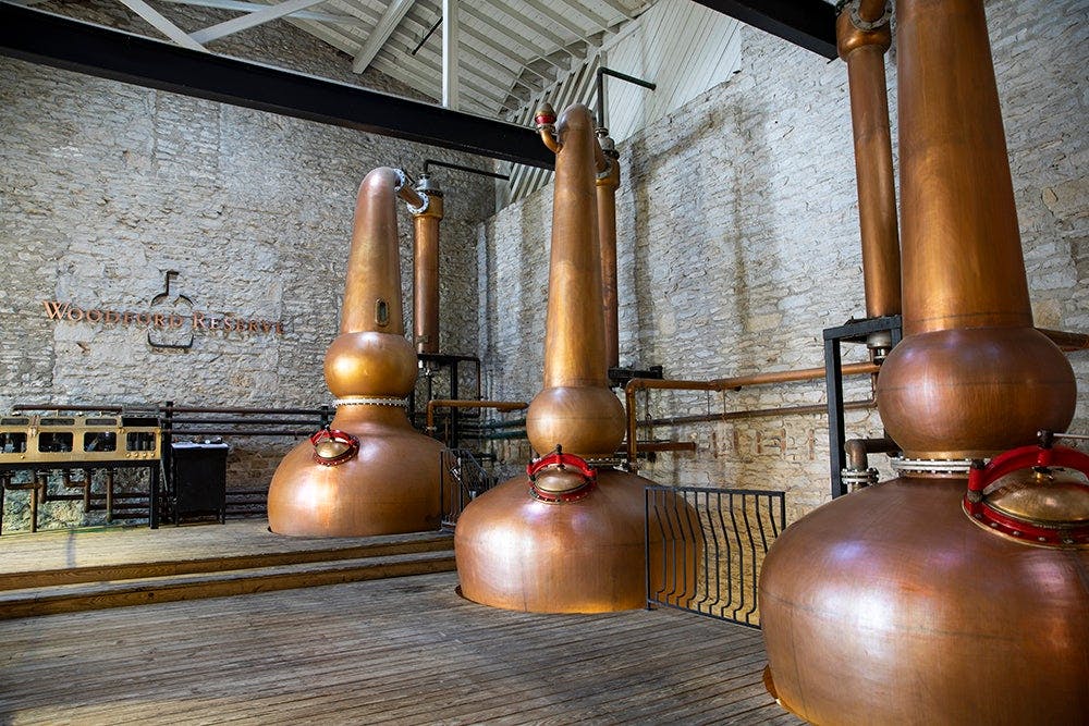 The iconic copper stills at woodford reserve's distillery
