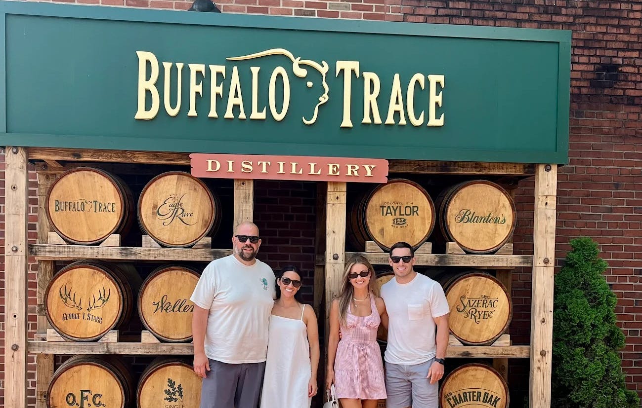 A group of people visiting buffalo trace on a mint julep experiences tour