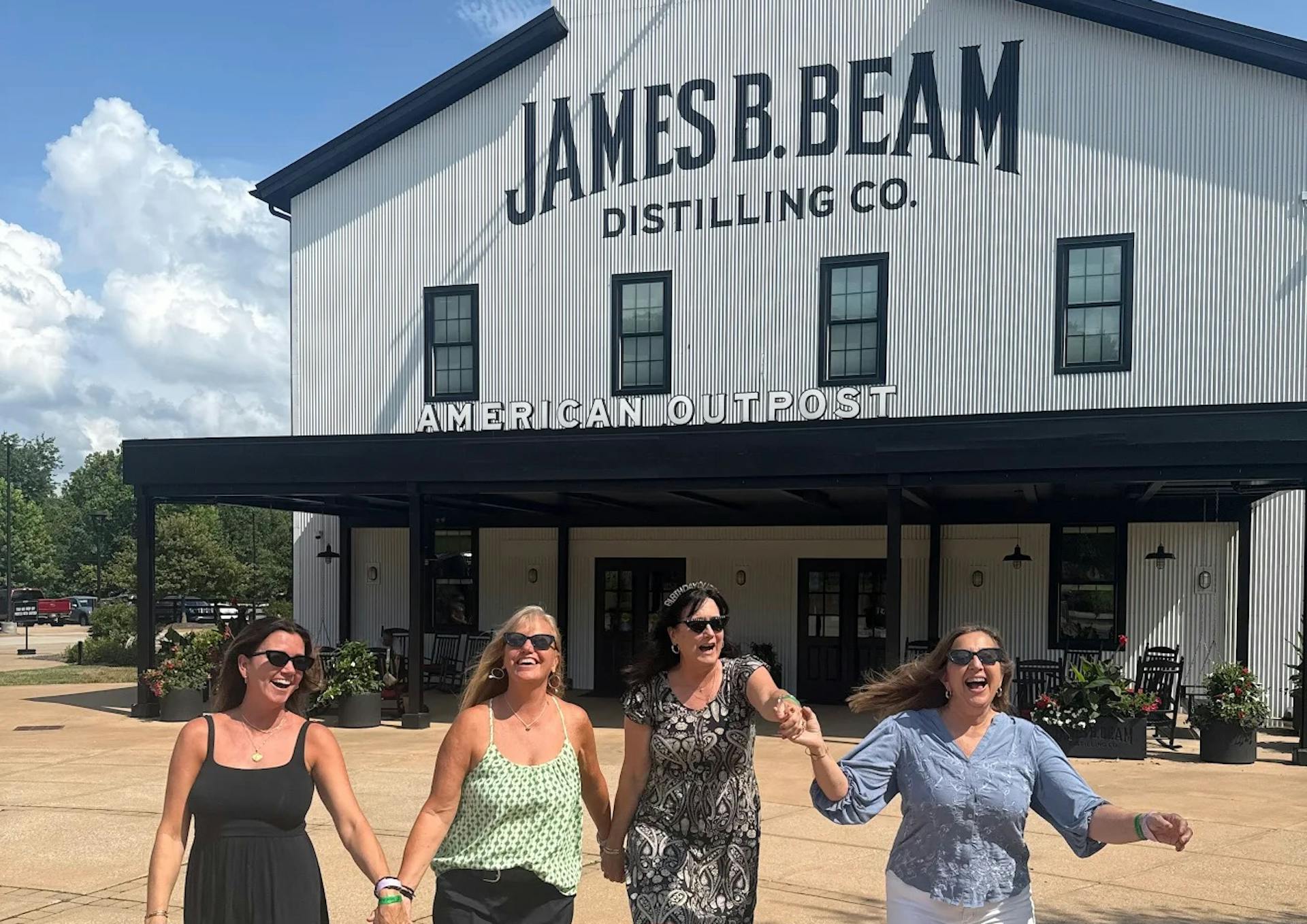 A group enjoying a custom tour at james b beam distillery, curated by mint julep experiences
