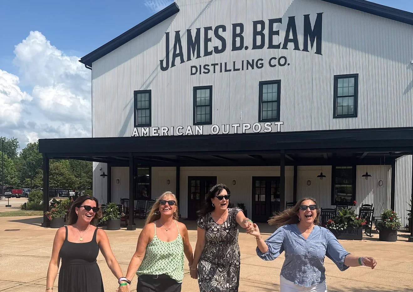 A group enjoying a custom tour at james b beam distillery, curated by mint julep experiences