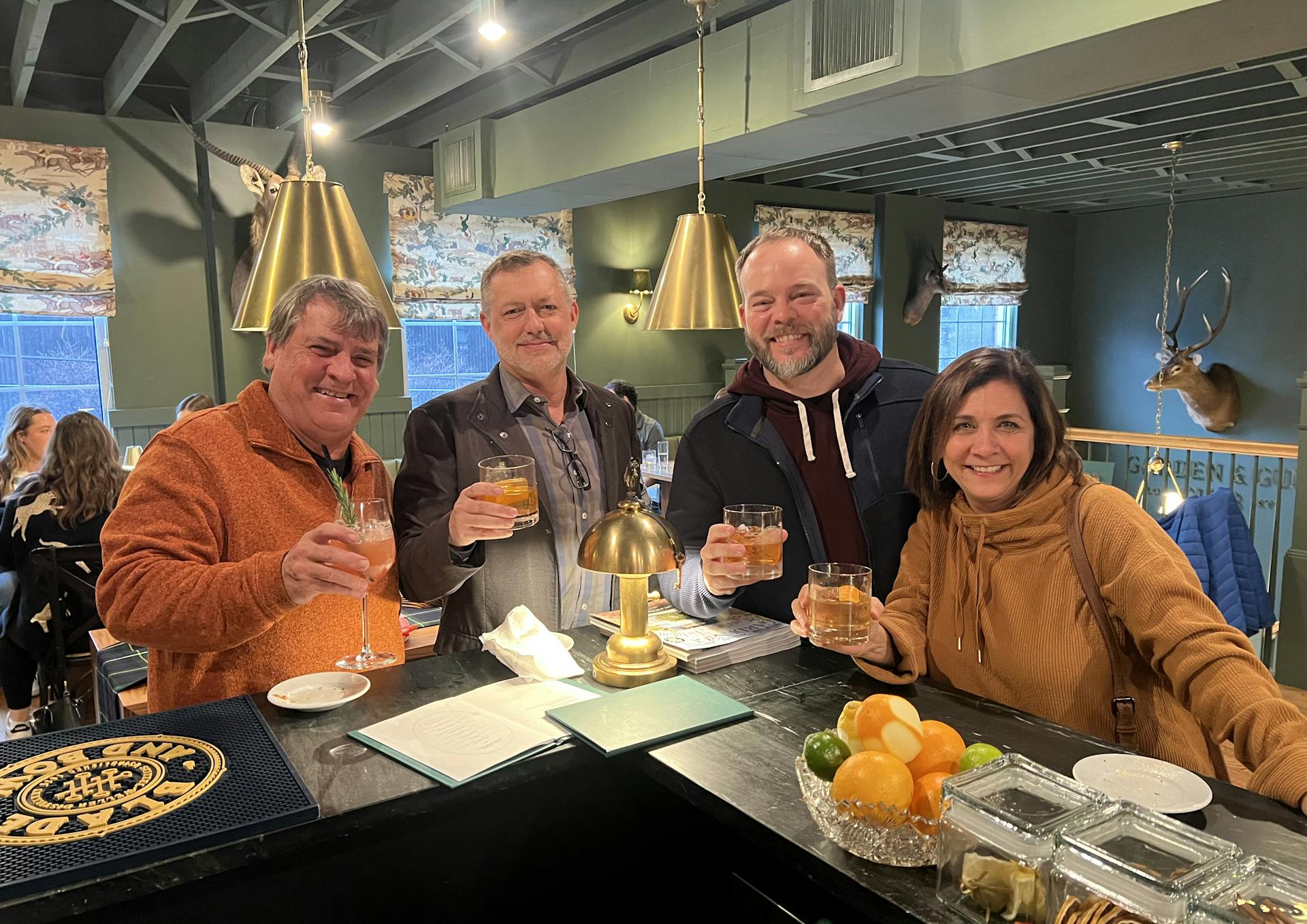 a group of people enjoying a stitzel-weller tour on their mint julep experiences itinerary