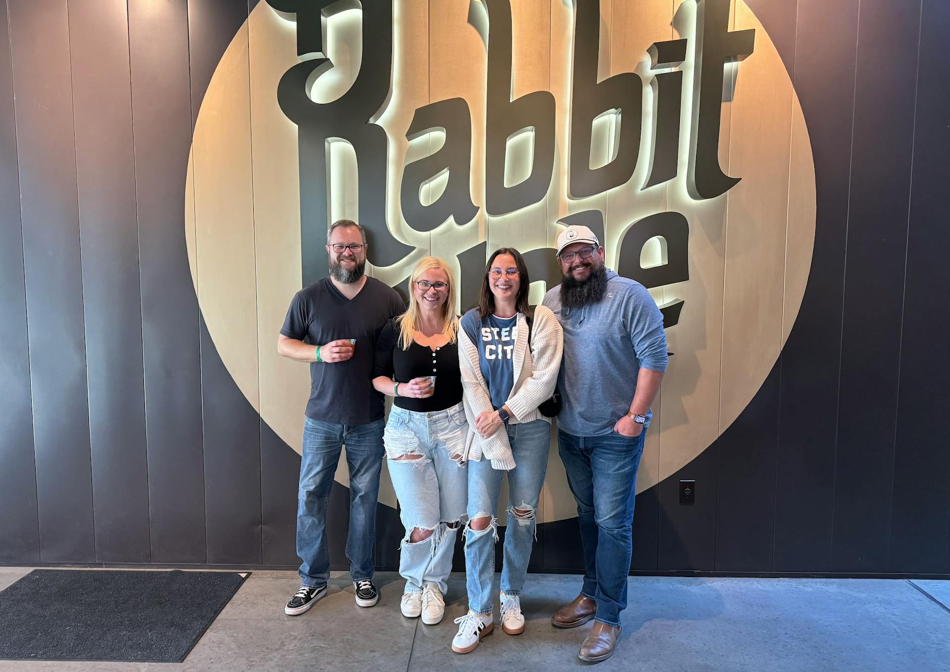 a group of people on a mint julep experiences tour visiting rabbit hole distillery