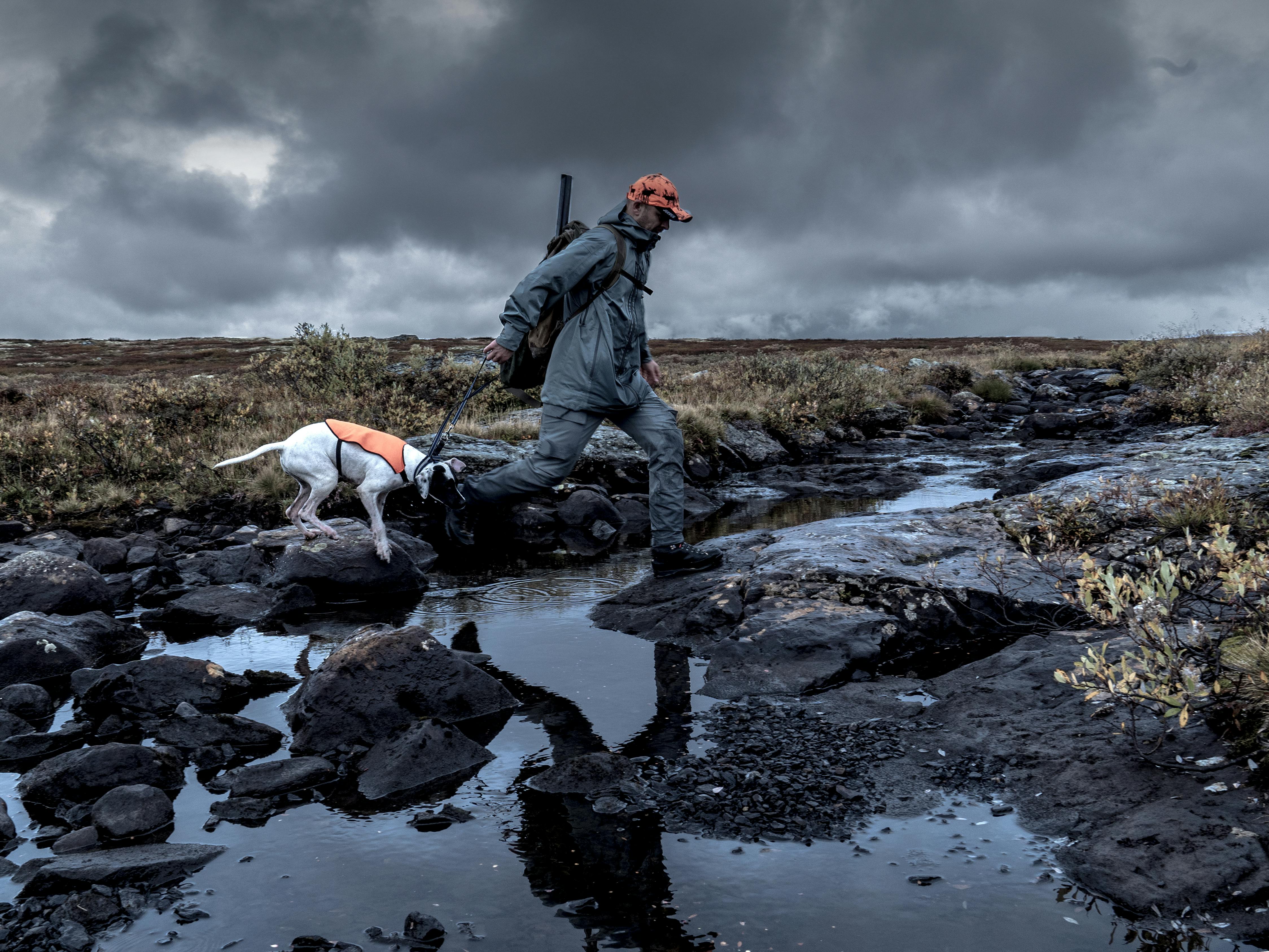 Full set of Tundra Shell Jacket and Tundra Flex Pant in Sedona Sage color way, intended for mountain hunting.