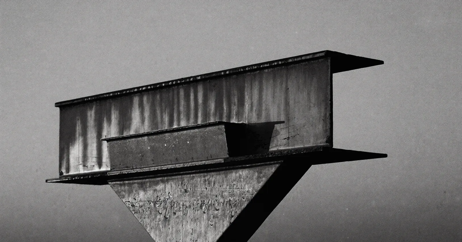 Slow structural erosion, SME margin compression, contemplative black and white