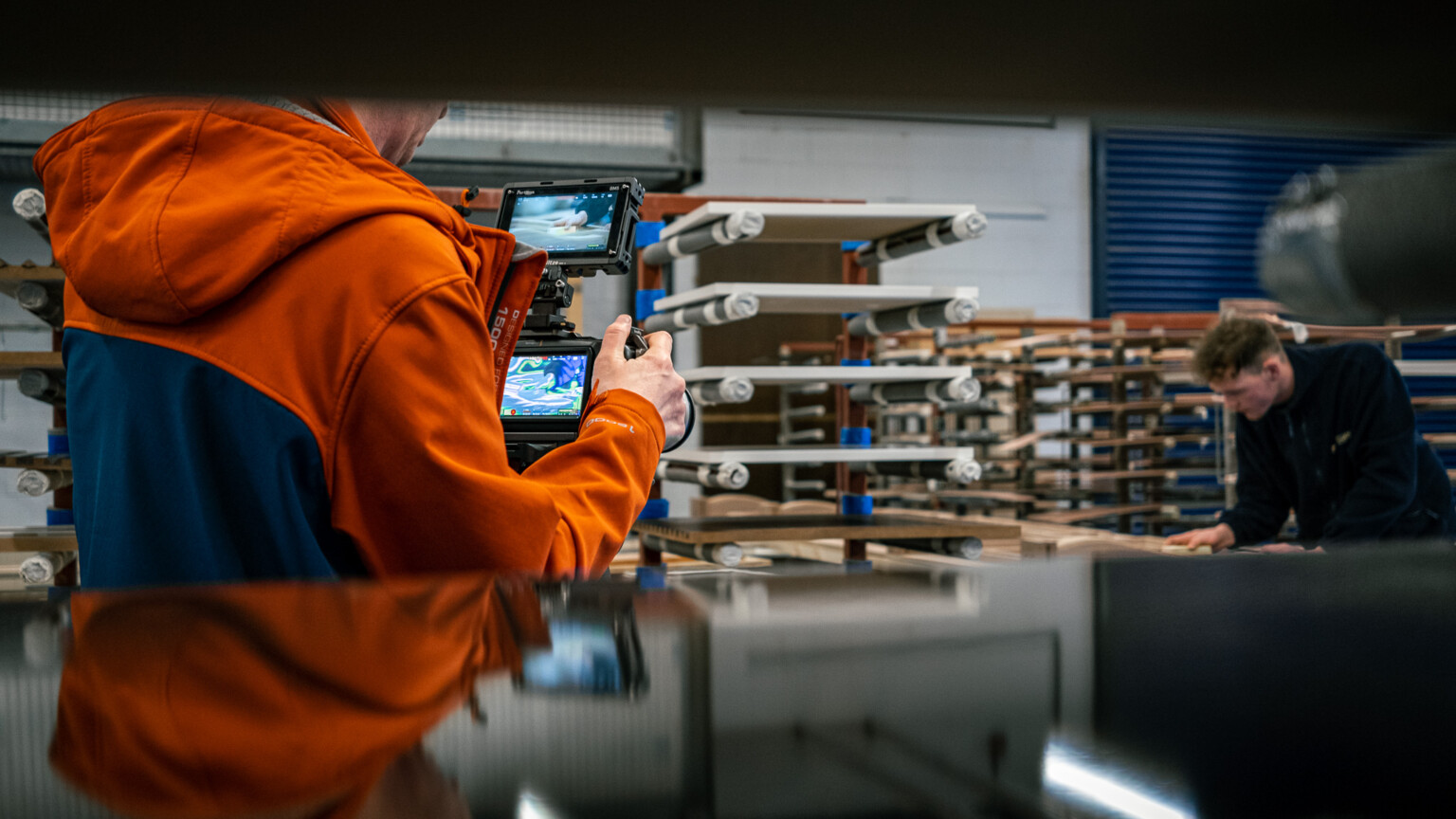 Filming joiner sand a piece of bespoke joinery