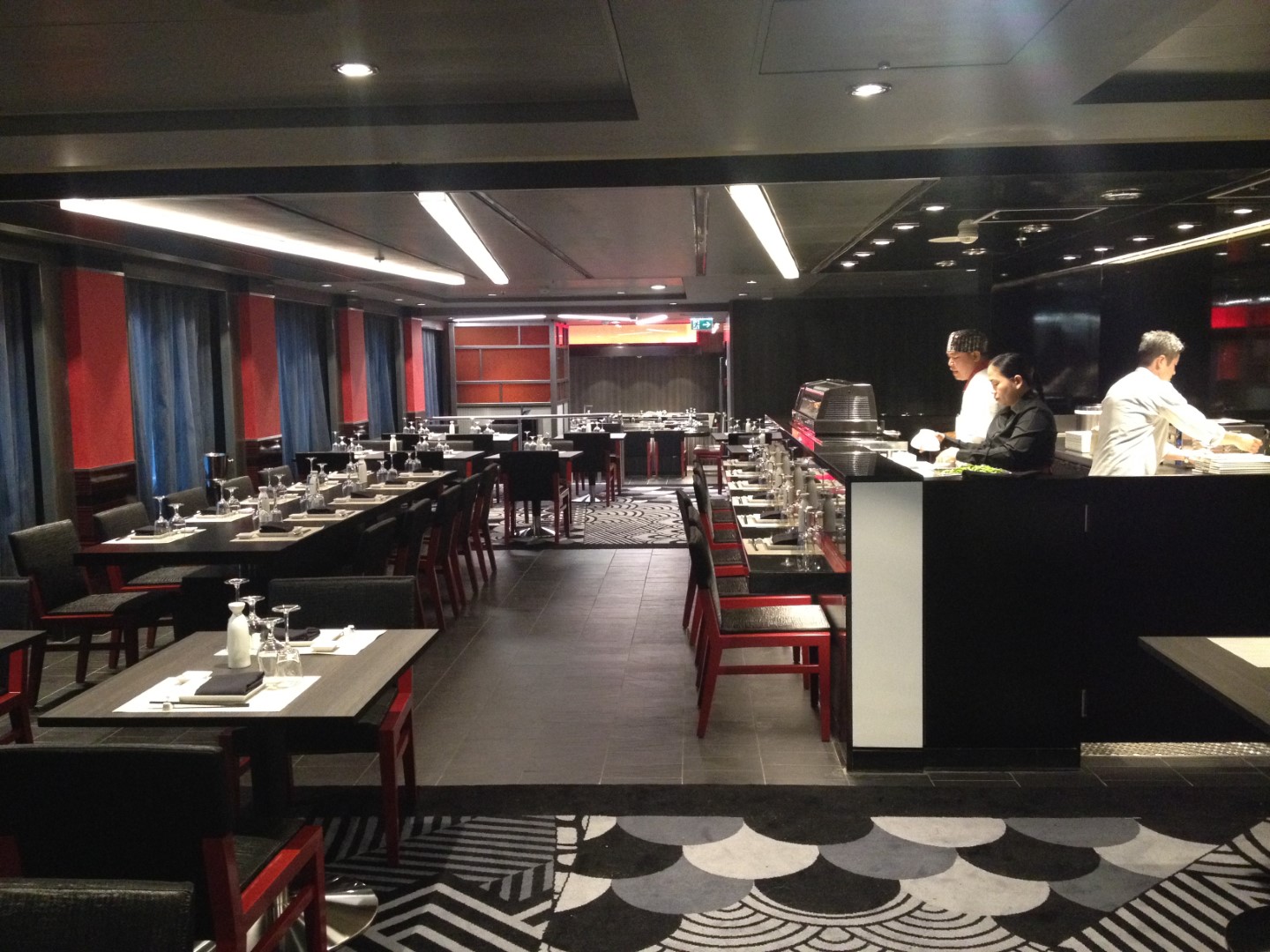 Restaurant with two chefs preparing service