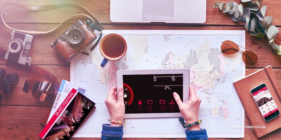 birds eye view of person working on tablet computer at desk