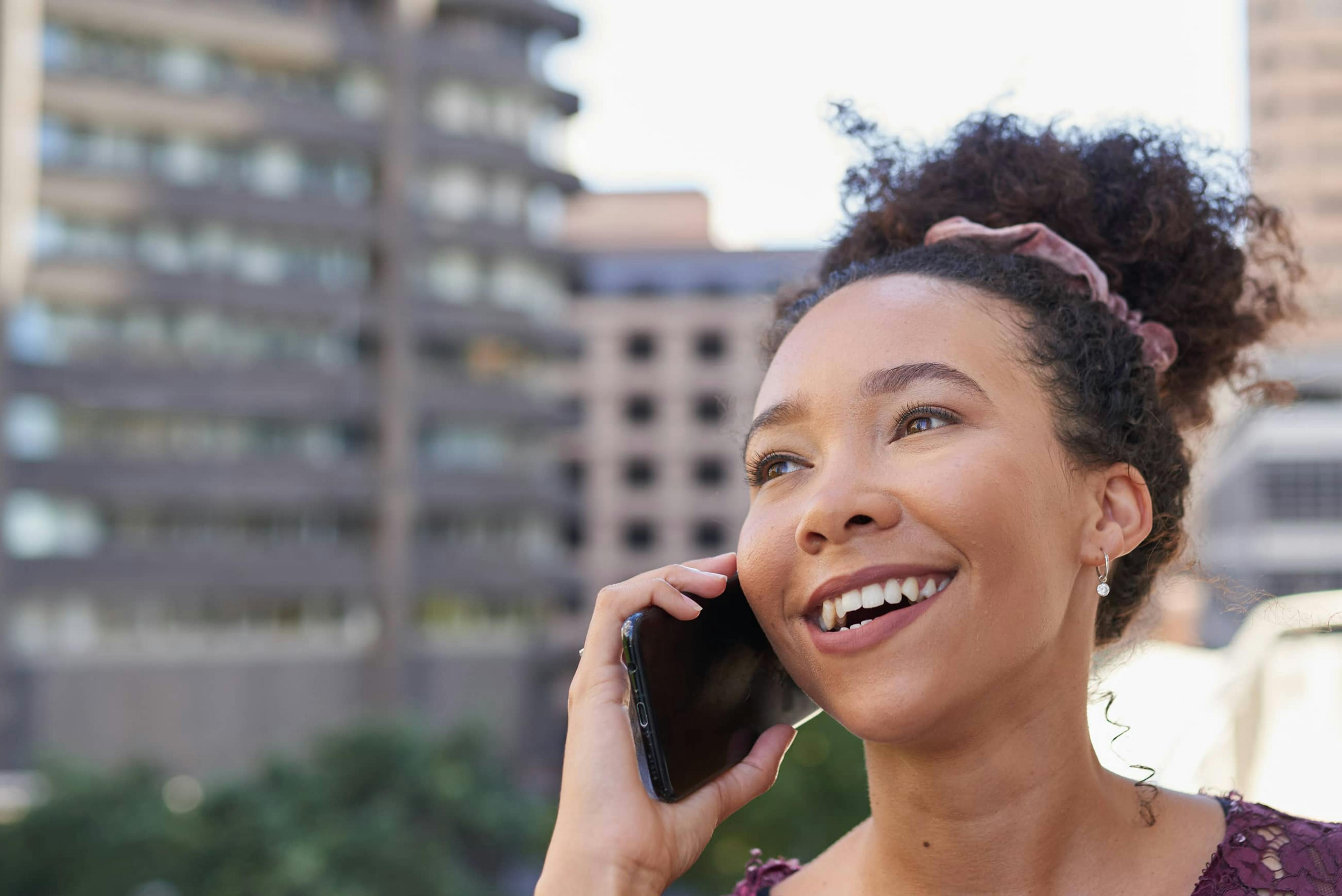 Woman on her phone talking to a friend