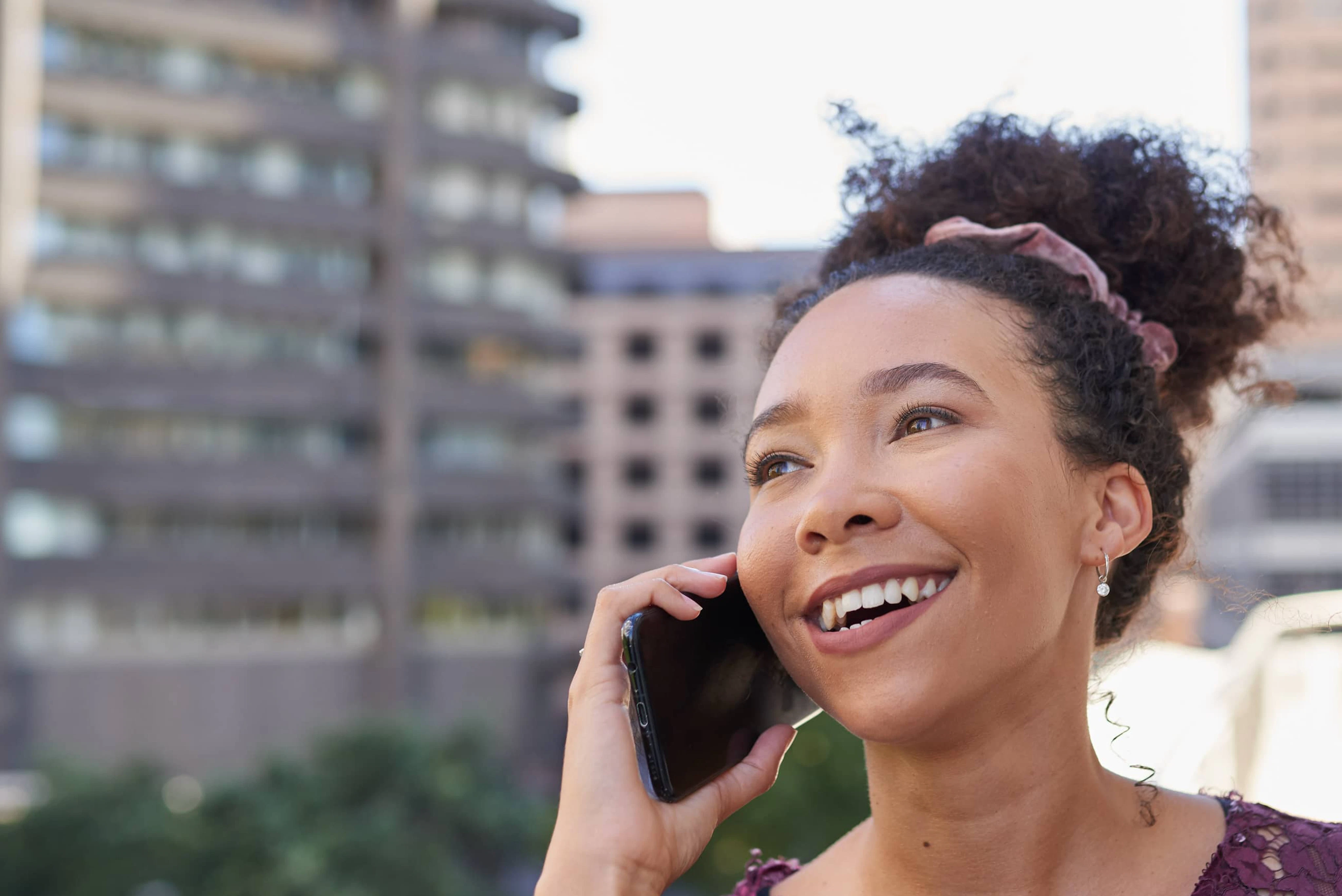 Woman on her phone talking to a friend