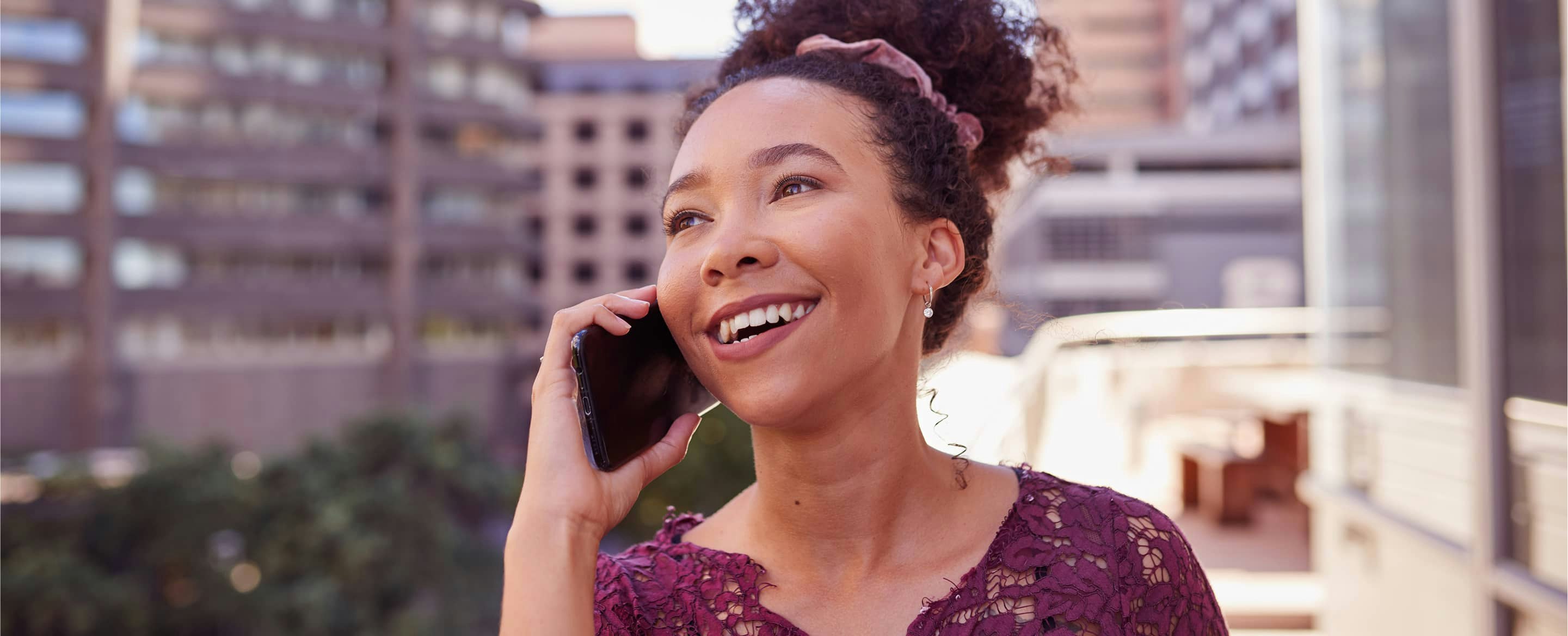 Woman in the city making a phone call
