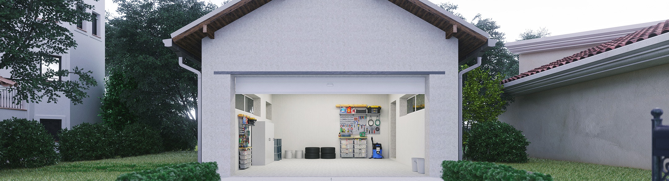 Open garage door in front of empty driveway