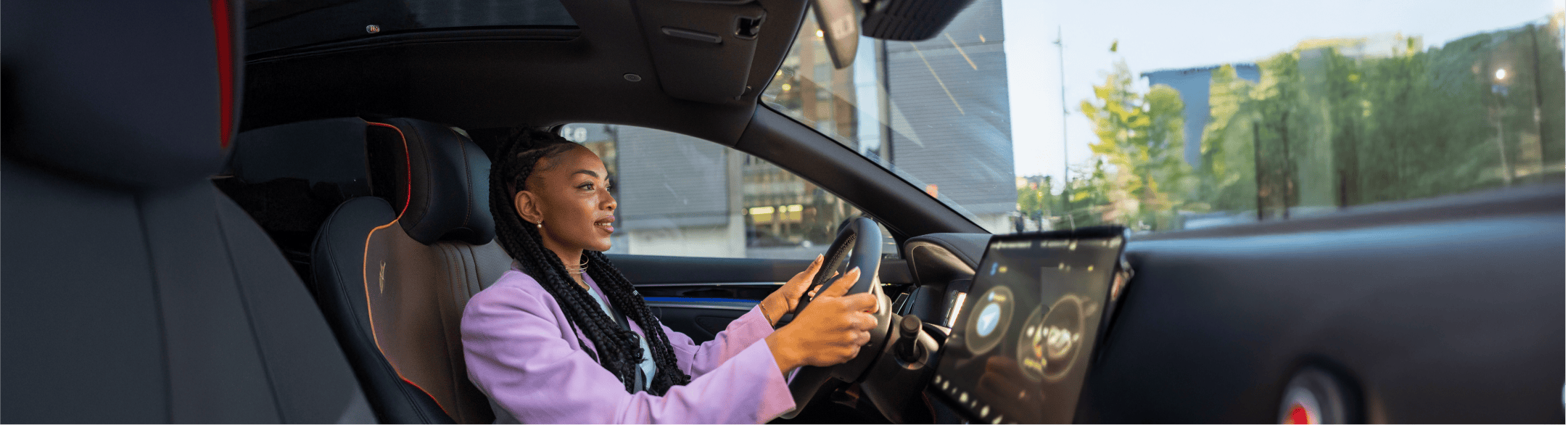 Young woman driving her car