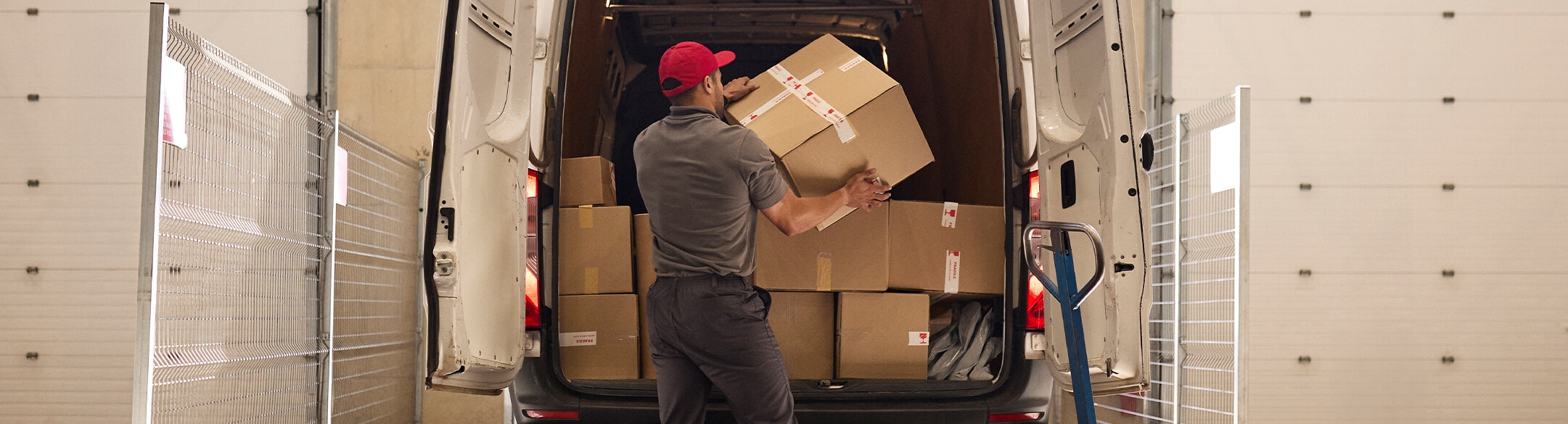 Man loading boxes into a truck