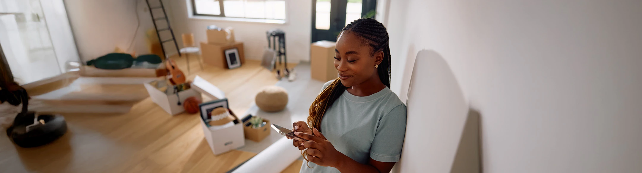 Woman on phone booking an Uber