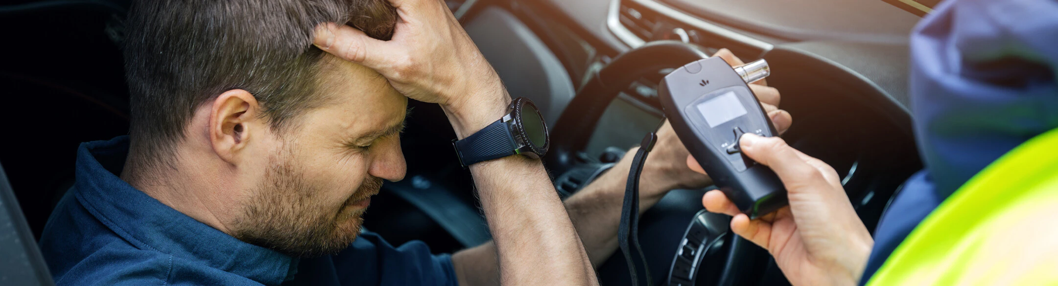 Man failing breathalyzer test