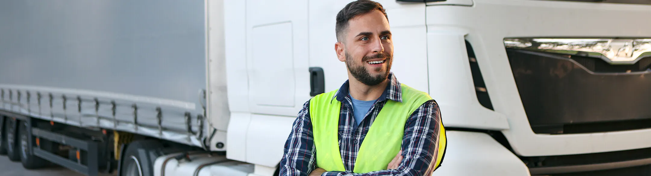 Man standing in front of truck