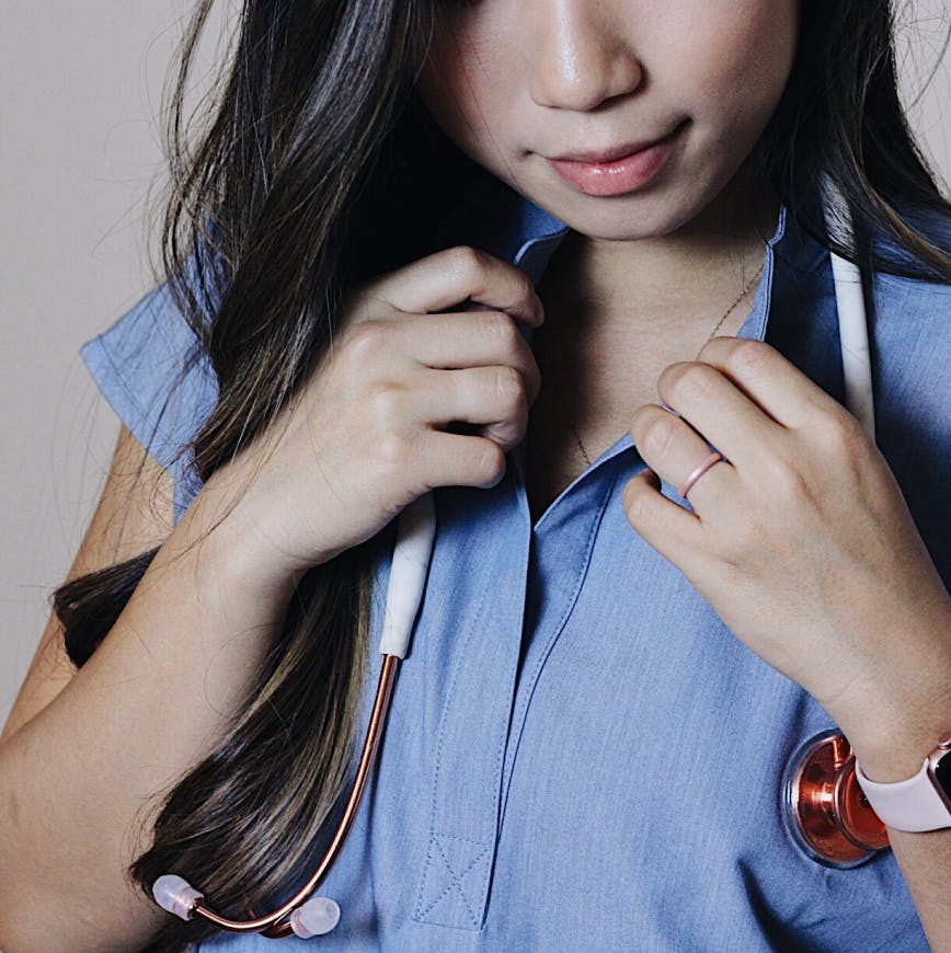 Nurse wearing an enso ring with stethascope around neck