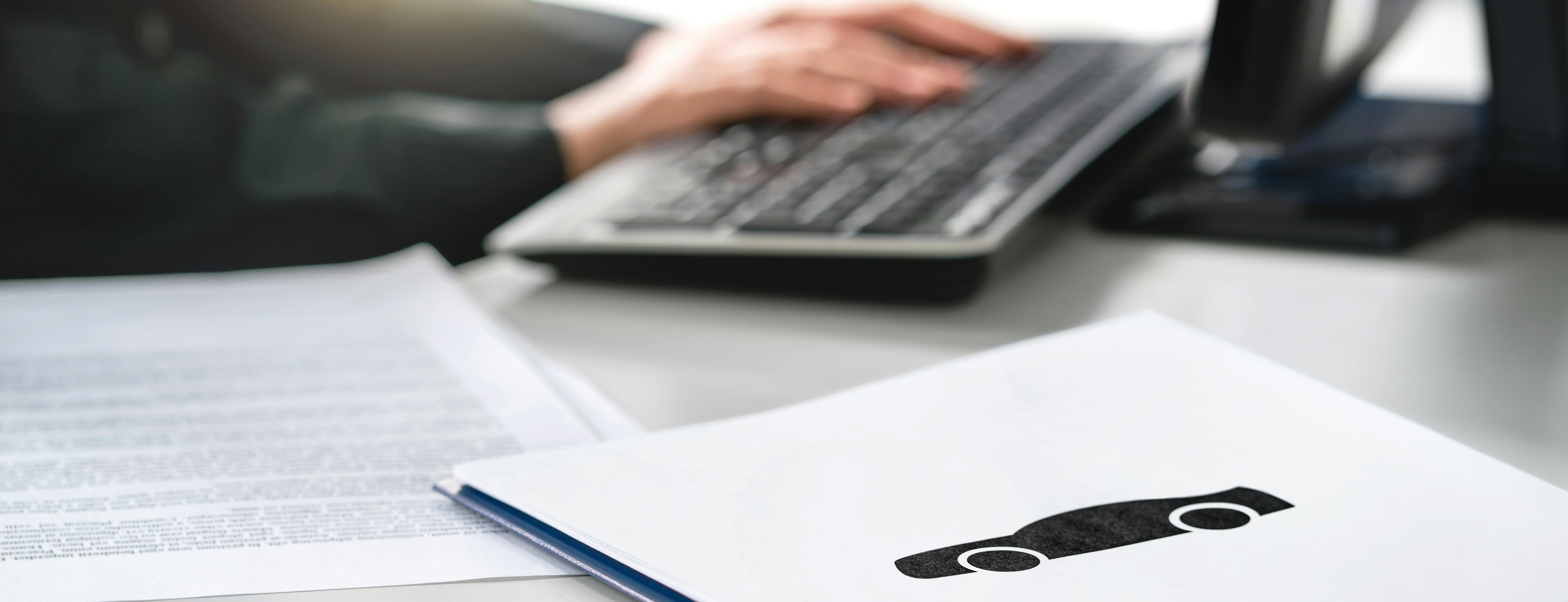 Car deal on table at a dealership