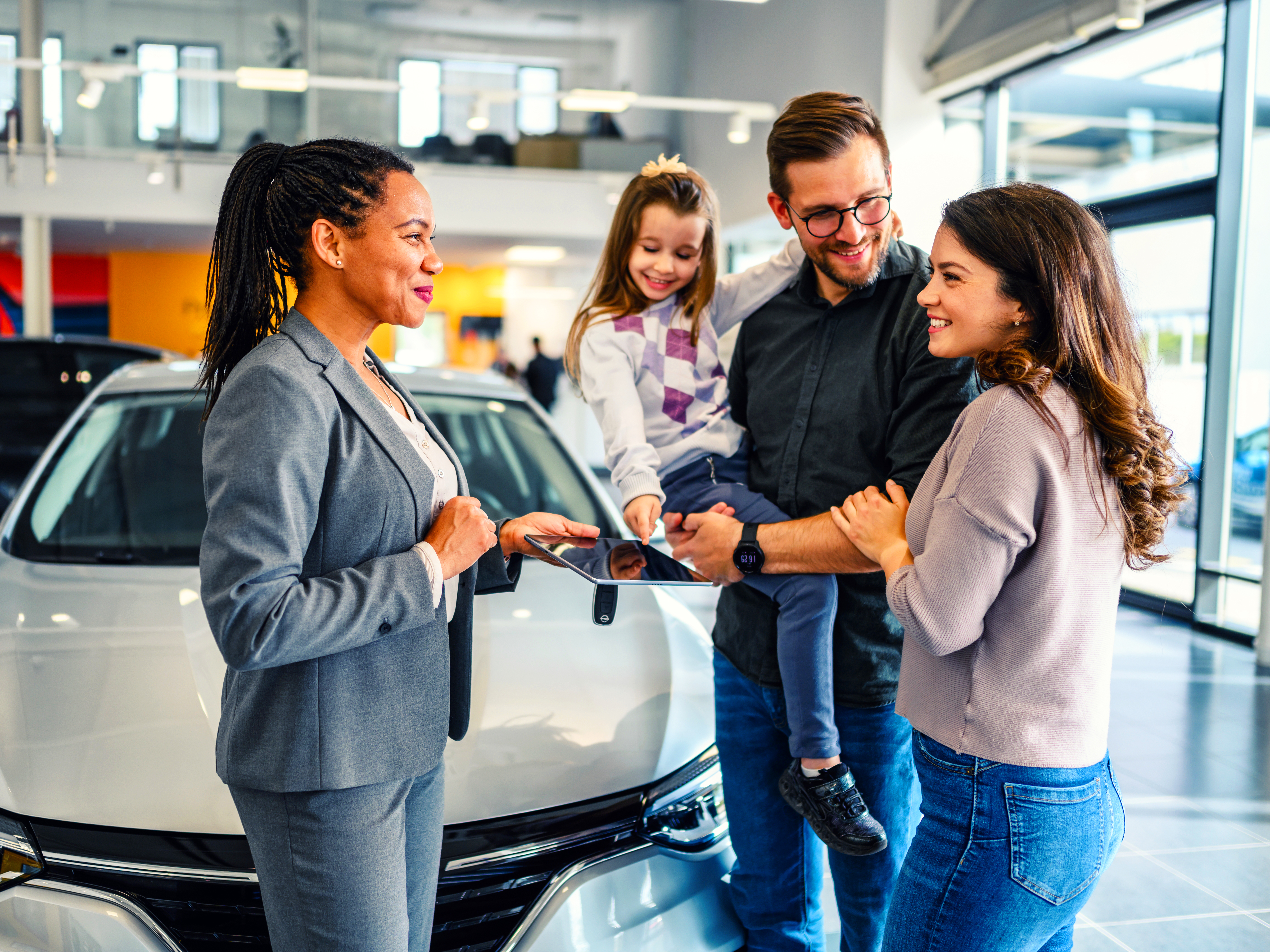 Family-at-car-dealership