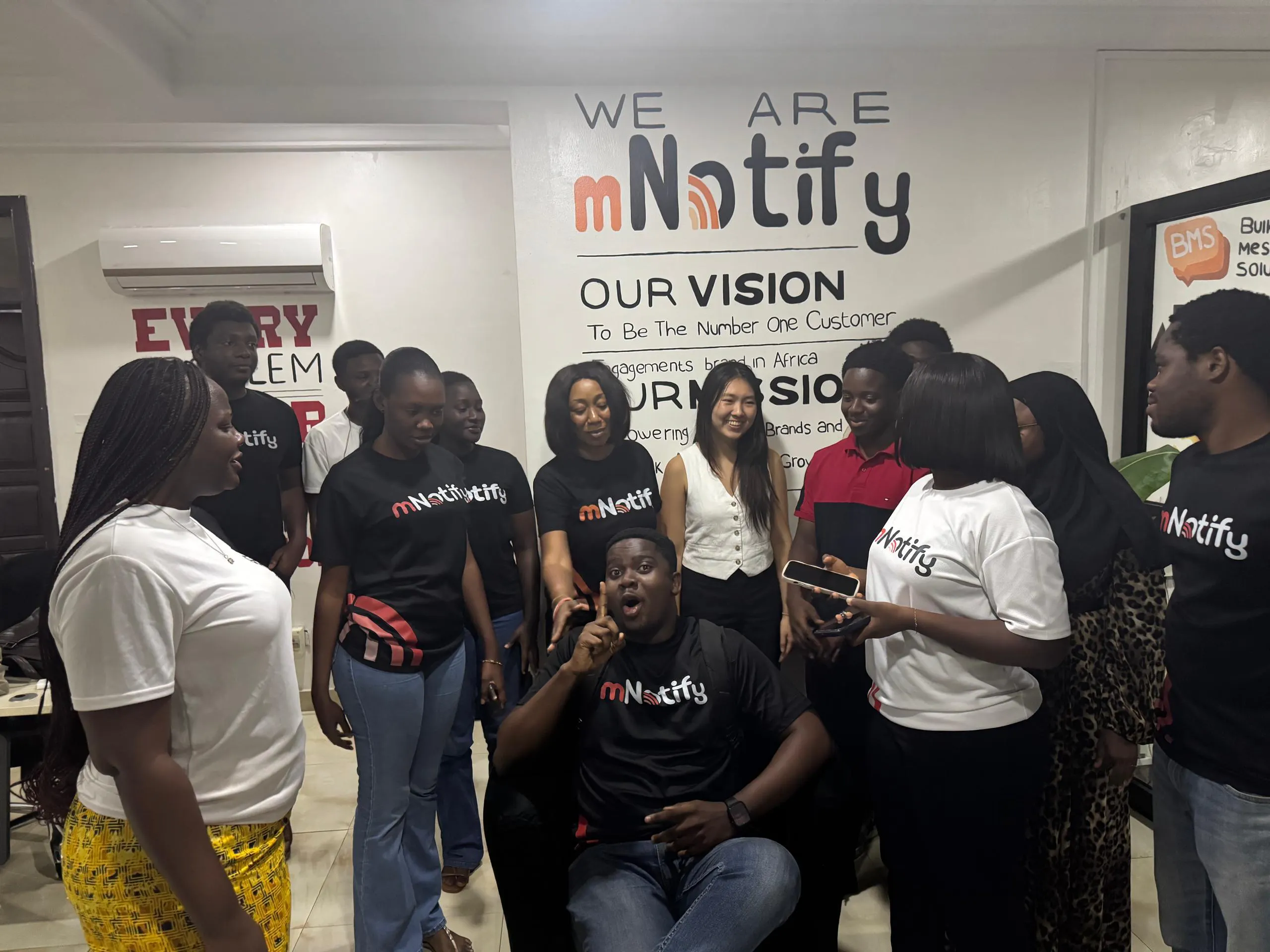 Interns celebrating together at mNotify
