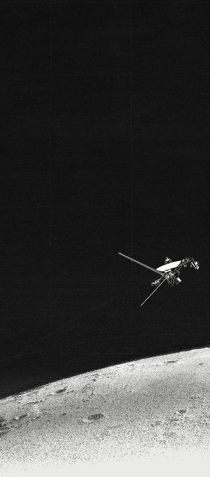 Dark image of a satellite orbiting a large planet