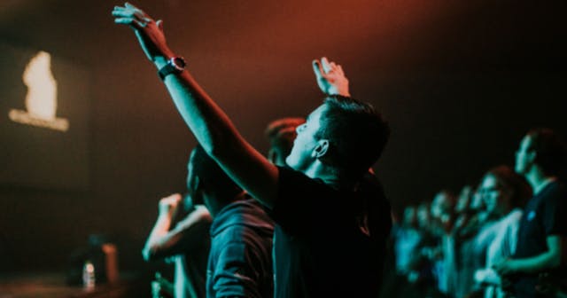 arms raised