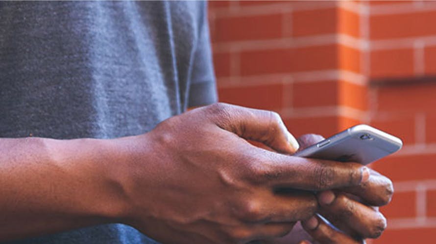 A person holding a cell phone