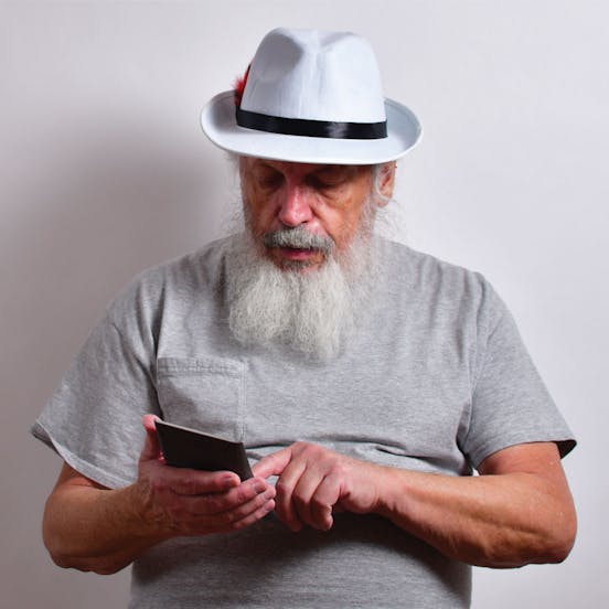 A man looking at a phone