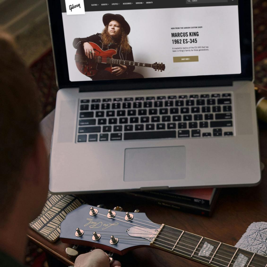 Computer with Gibson.com on the screen
