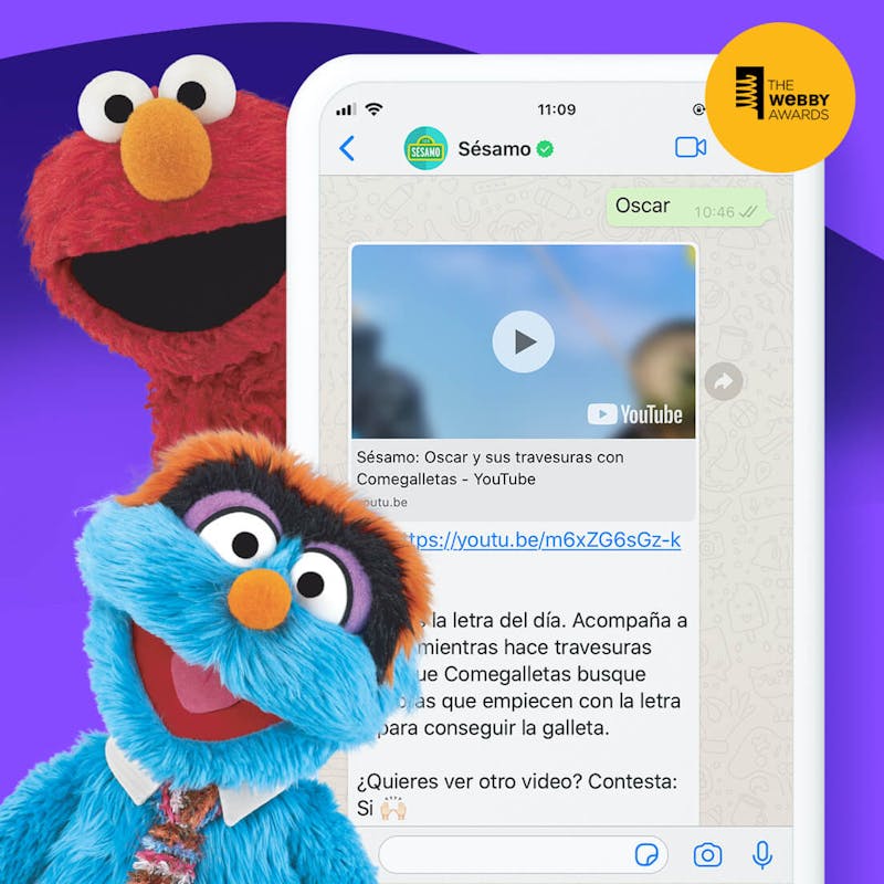 Screenshot of a Sesame Workshop app showing Spanish content and Sesame characters