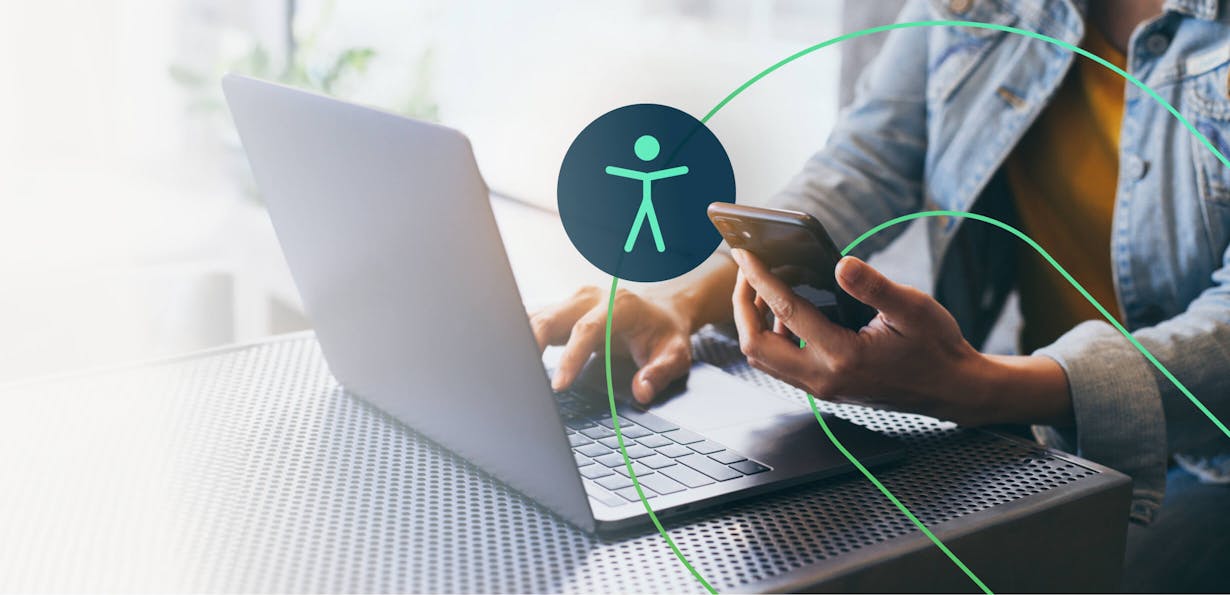 Individual simultaneously using cellphone and laptop