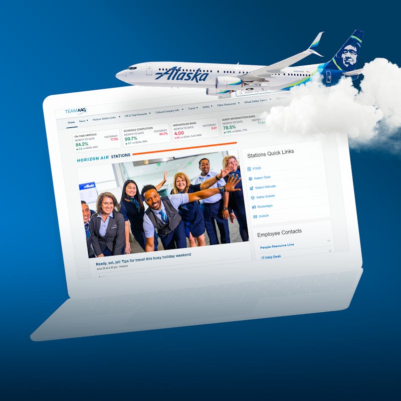 Alaska Airlines intranet screen on a laptop with a plane