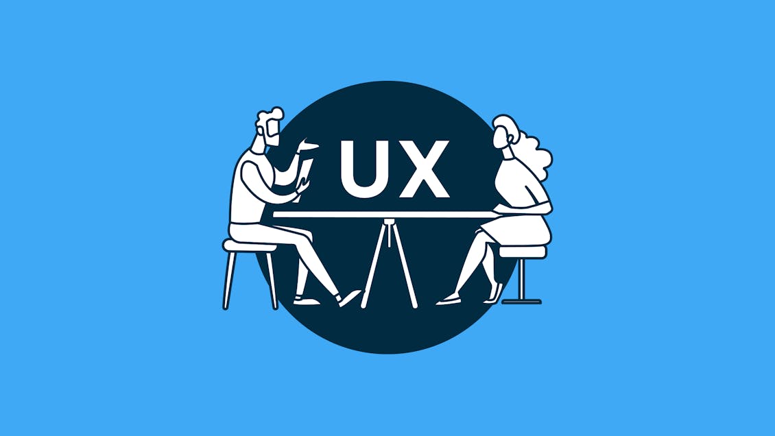 Illustration of 2 people sitting at a table with UX on it