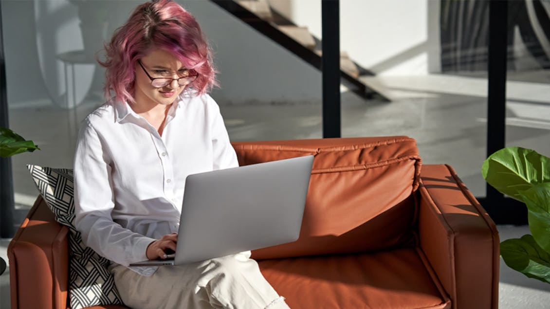 Woman with a computer working at home